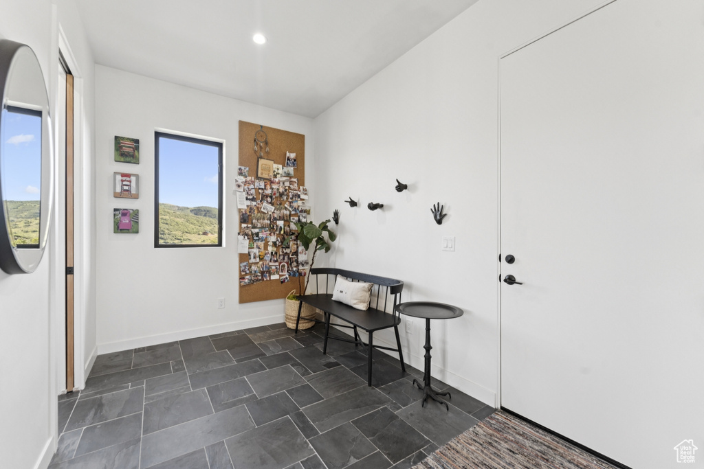 Foyer featuring baseboards