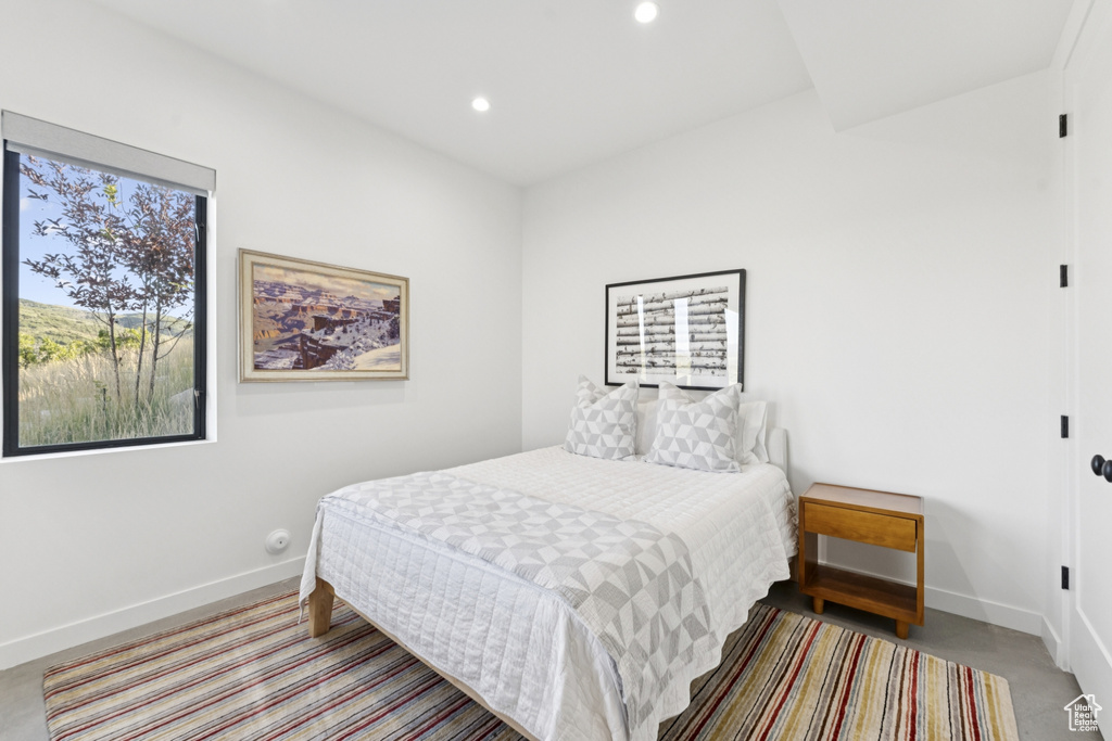 Bedroom featuring baseboards and recessed lighting