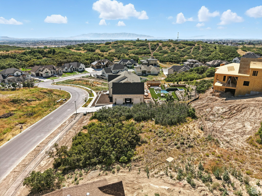 Aerial view of residential area with a mountain backdrop