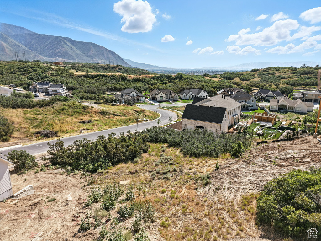 View of mountain background featuring nearby suburban area