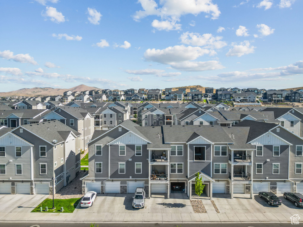 Aerial perspective of suburban area with mountains
