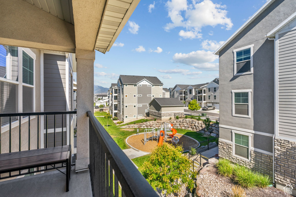 Balcony featuring a residential view