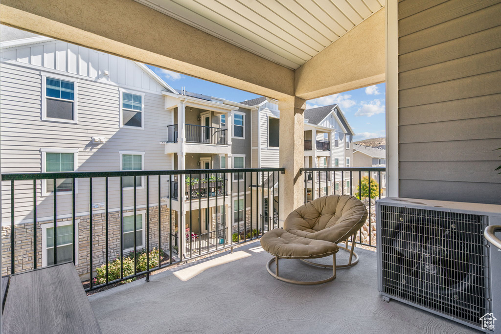 Balcony featuring a residential view