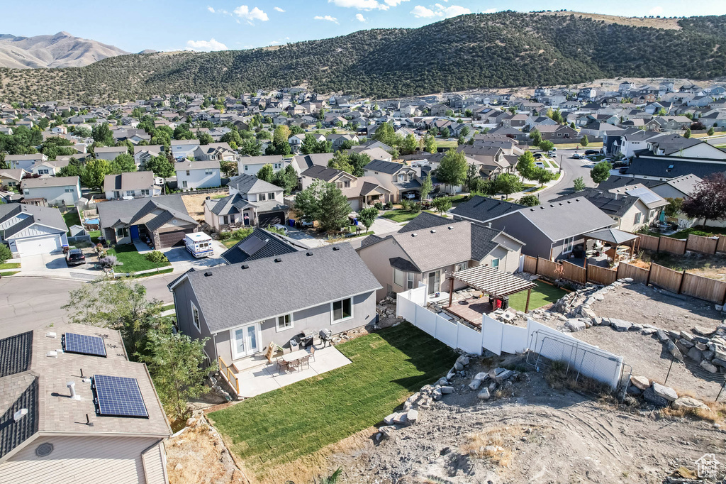 Aerial perspective of suburban area featuring mountains