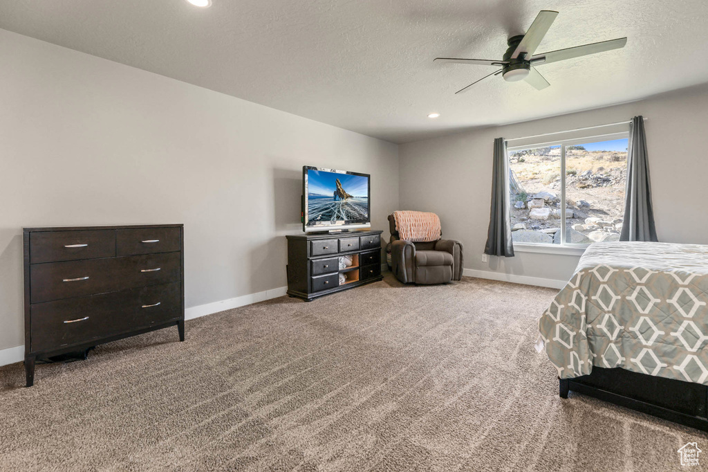 Bedroom featuring carpet flooring, a textured ceiling, ceiling fan, and recessed lighting