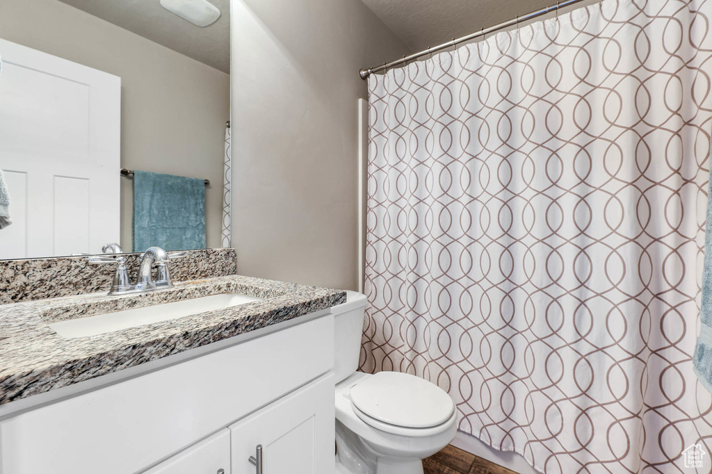 Bathroom featuring vanity and a shower with curtain