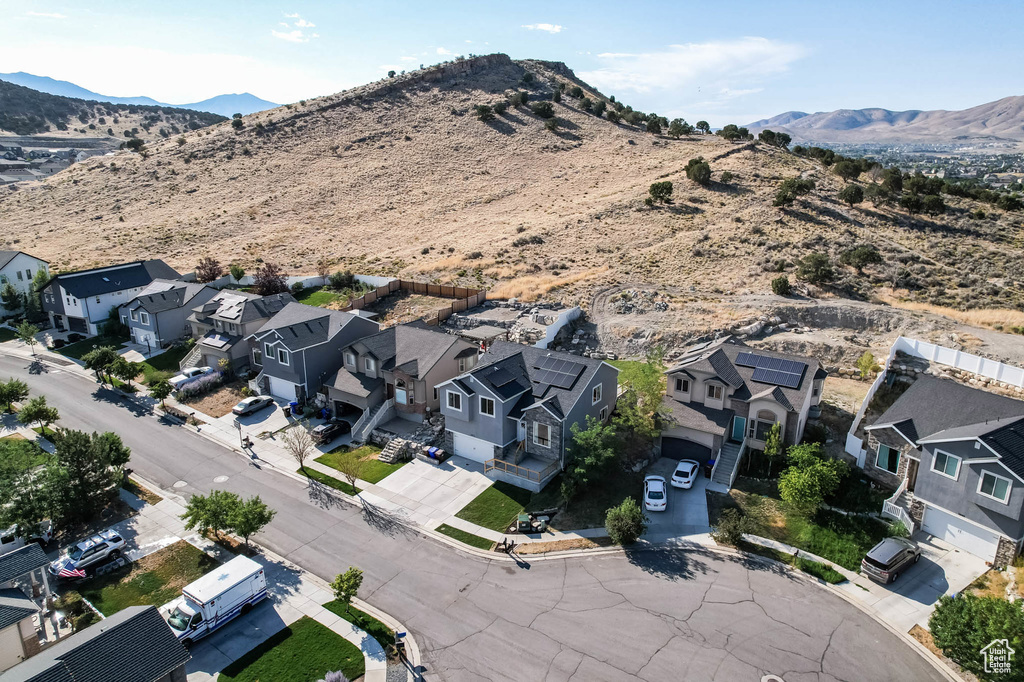 Aerial view of residential area with a mountain backdrop