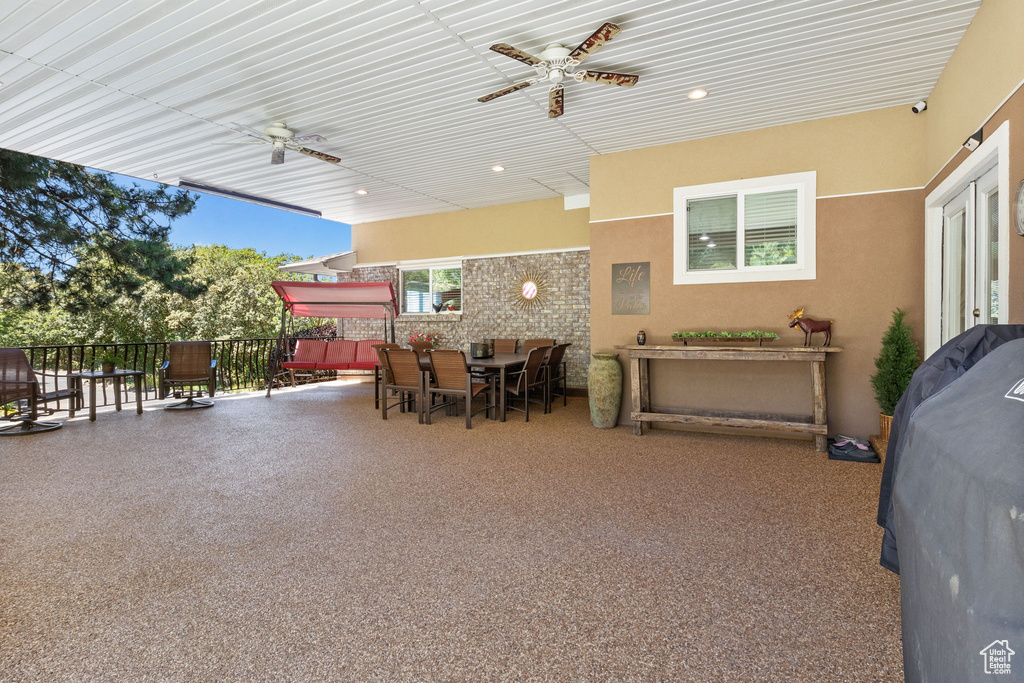 View of patio / terrace with ceiling fan and outdoor dining space