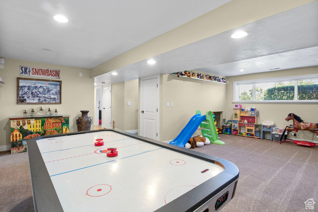 Playroom with carpet and recessed lighting