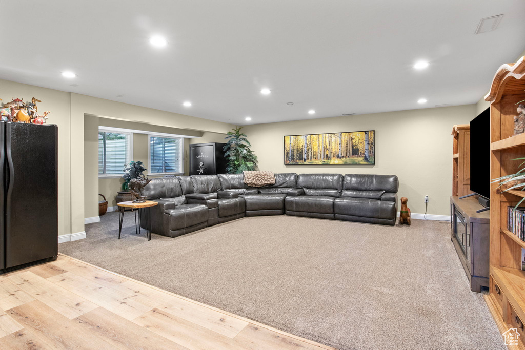 Living room featuring recessed lighting and wood finished floors