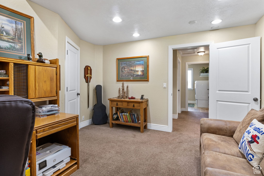 Carpeted office with recessed lighting