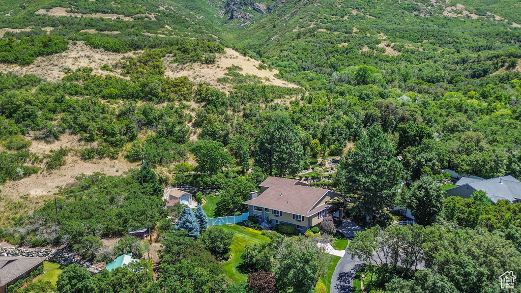 View from above of property featuring a forest