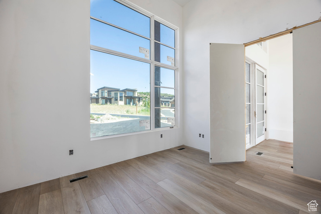Unfurnished room featuring wood finished floors