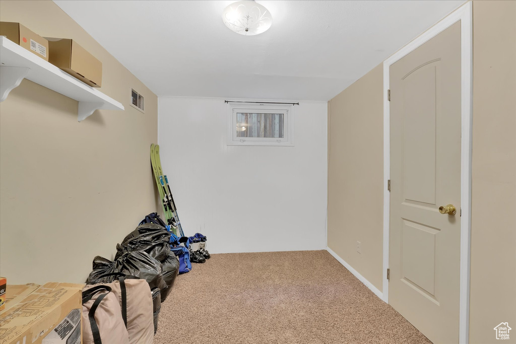 Exercise room featuring carpet flooring