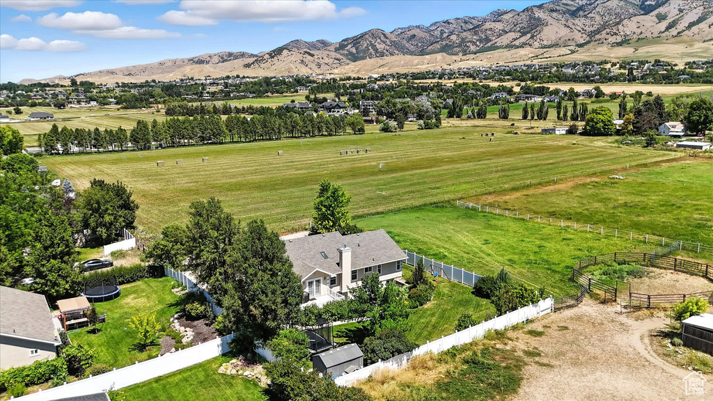 Aerial view of sparsely populated area featuring a mountainous background
