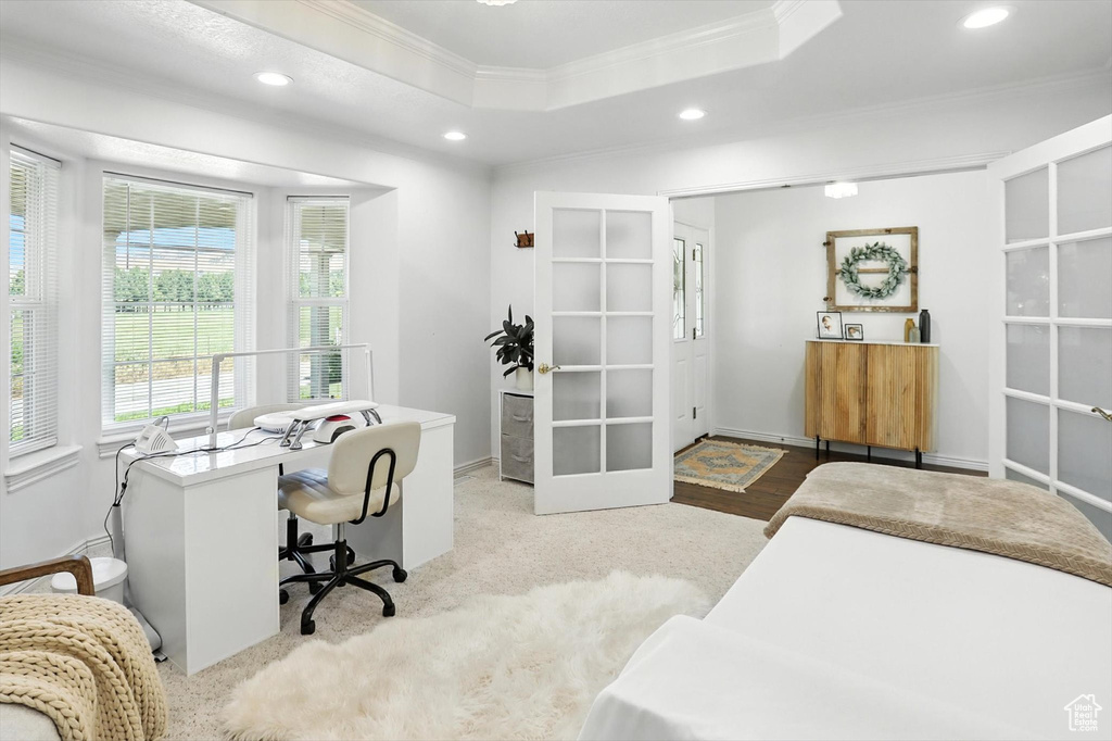 Carpeted home office featuring recessed lighting, ornamental molding, and a raised ceiling