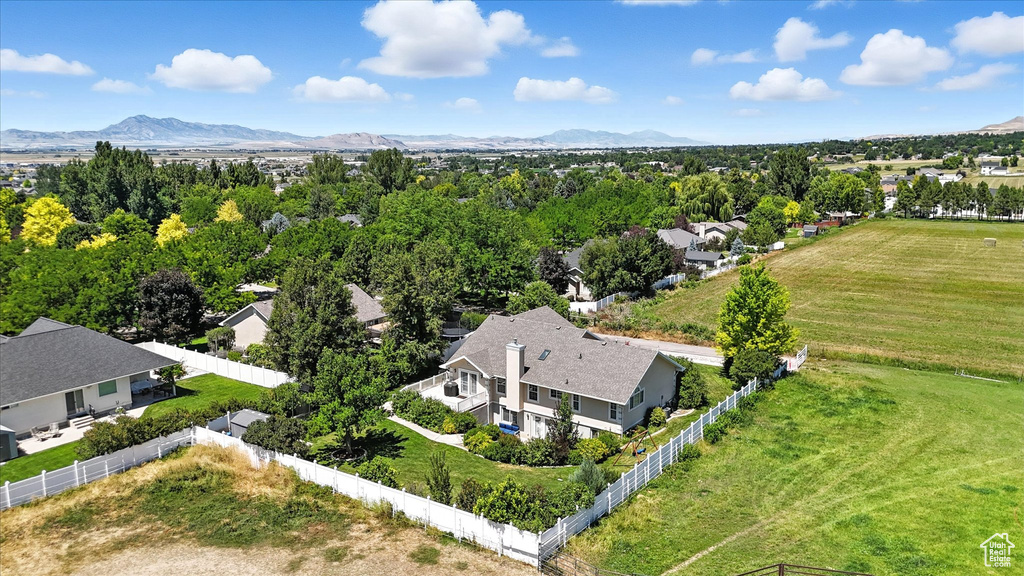 View of subject property with a mountainous background