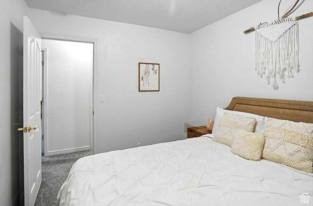 Bedroom with carpet