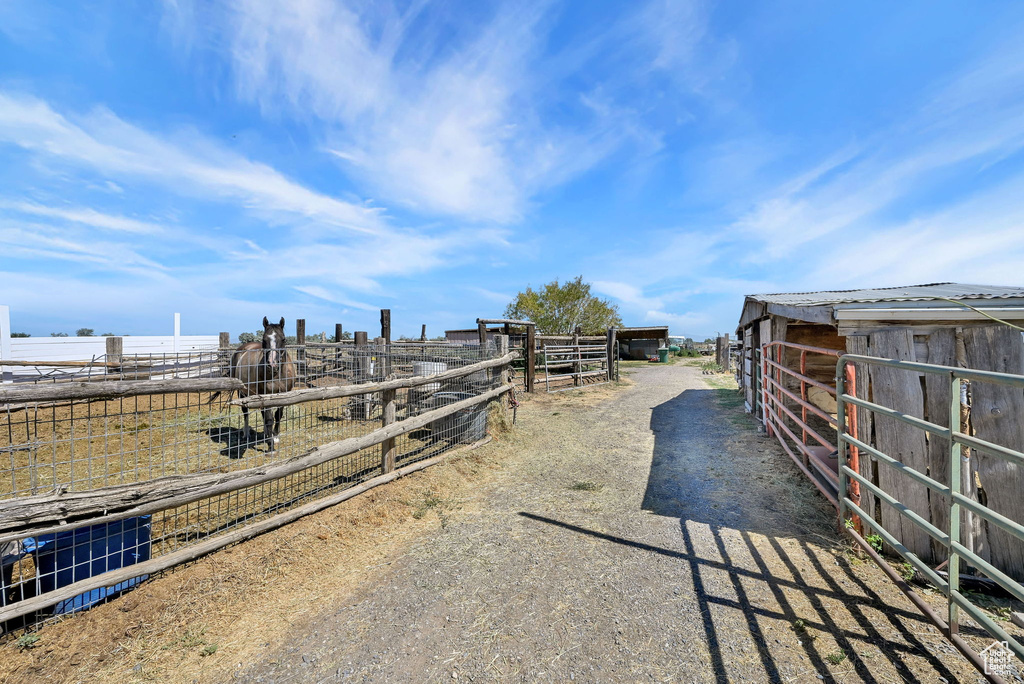 View of yard with an exterior structure and an outbuilding
