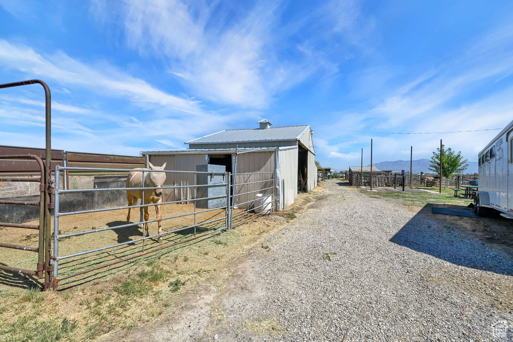 View of outbuilding featuring an exterior structure