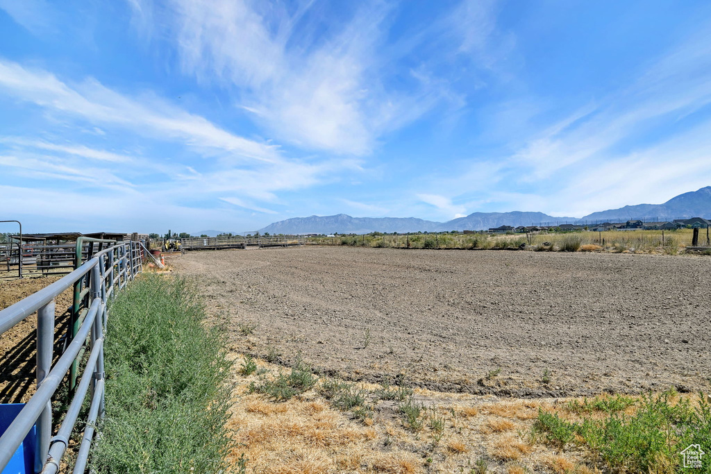 View of mountain background featuring rural landscape