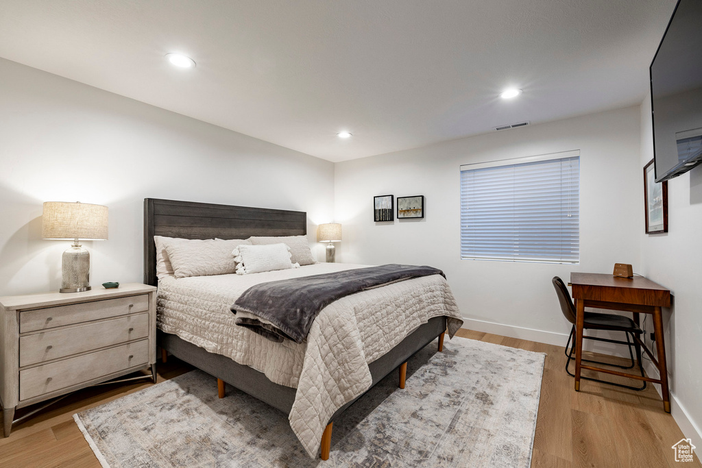 Bedroom featuring light wood finished floors and recessed lighting