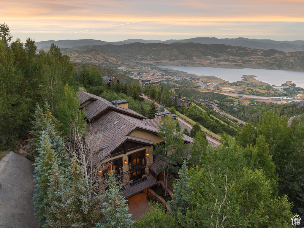 Aerial view at dusk of a water and mountain view