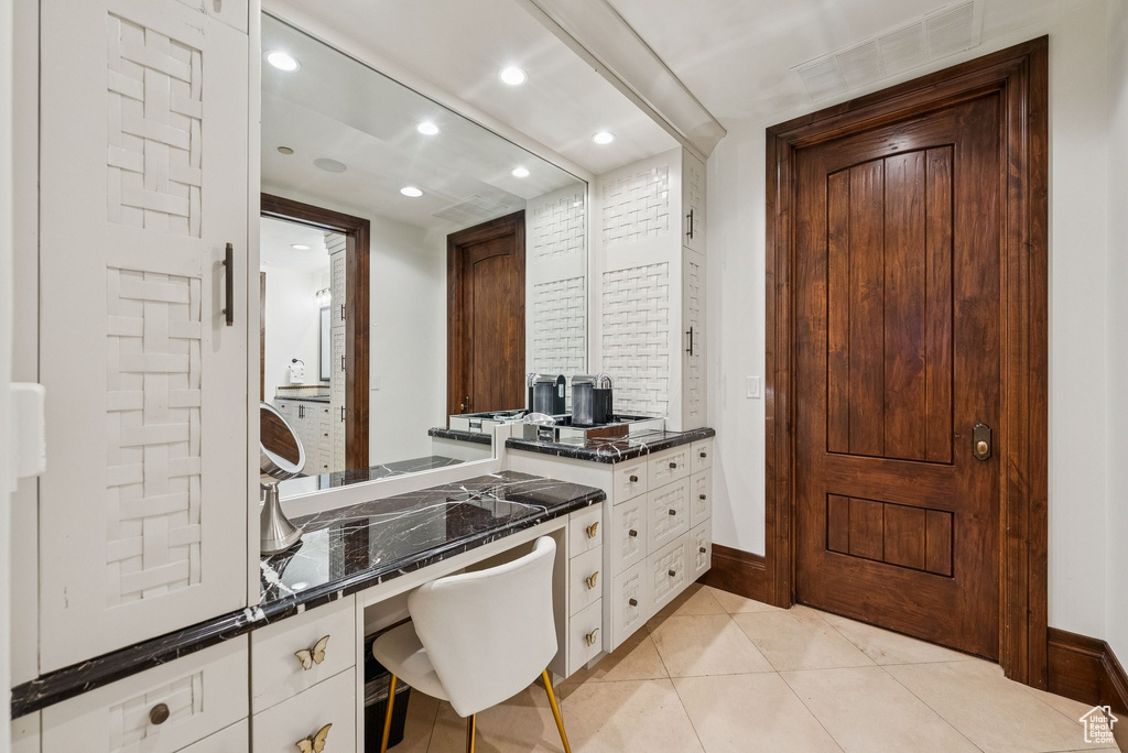 Office area featuring recessed lighting and light tile patterned floors