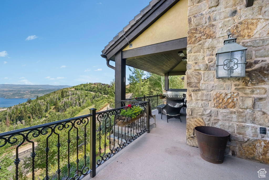 Patio / terrace featuring a mountain view