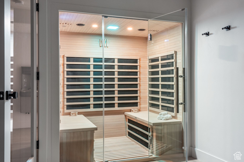 Sauna / steam room with recessed lighting and baseboards