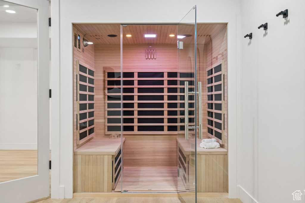Sauna featuring wooden ceiling