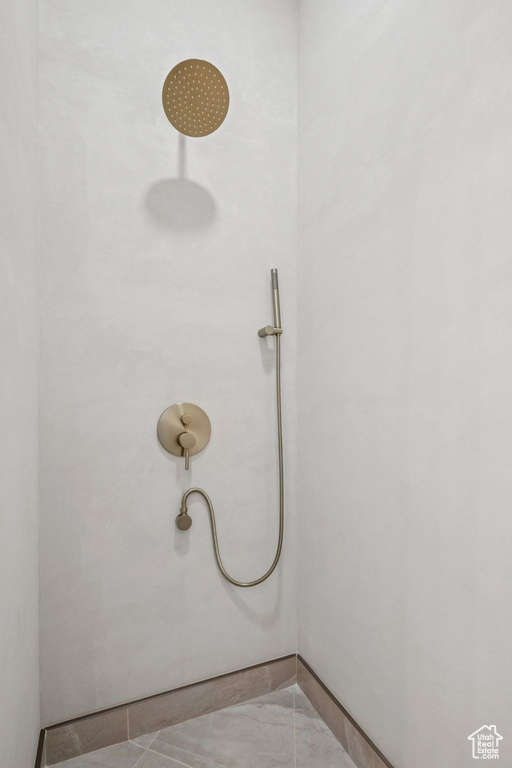 Bathroom featuring tiled shower