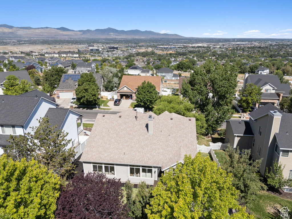 Aerial view of residential area with mountains
