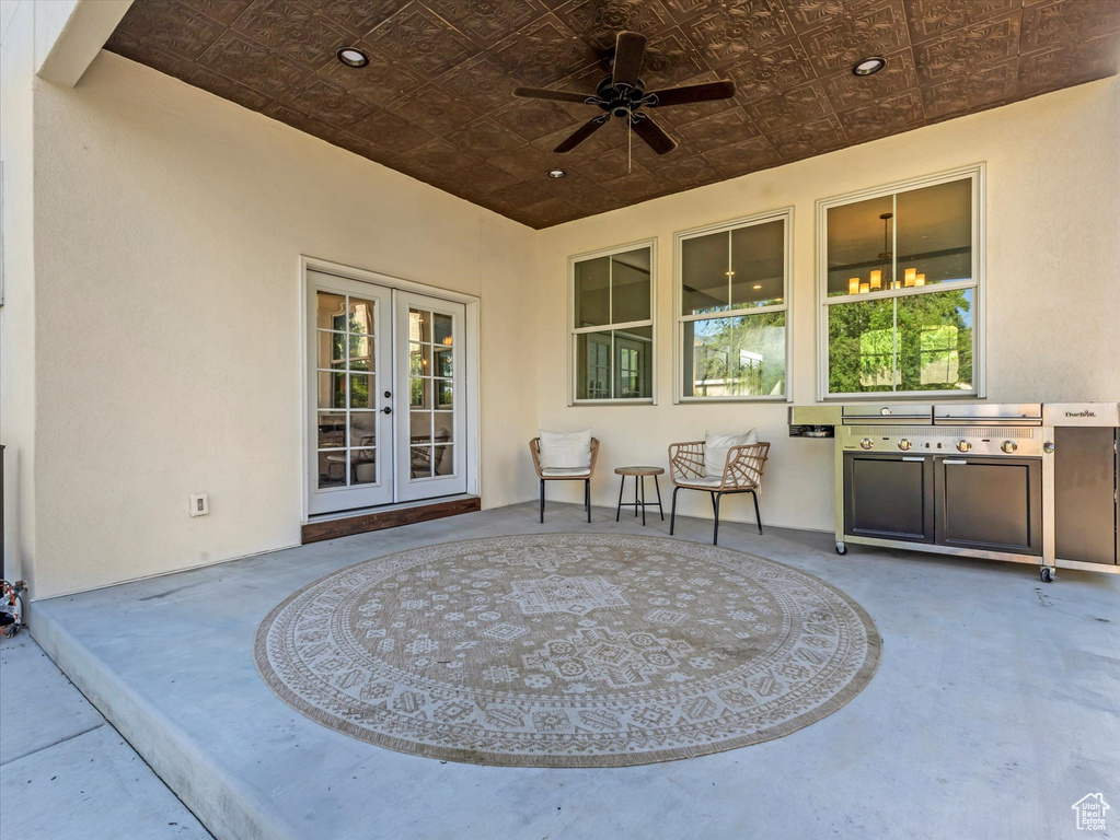 View of patio / terrace with ceiling fan, french doors, and area for grilling
