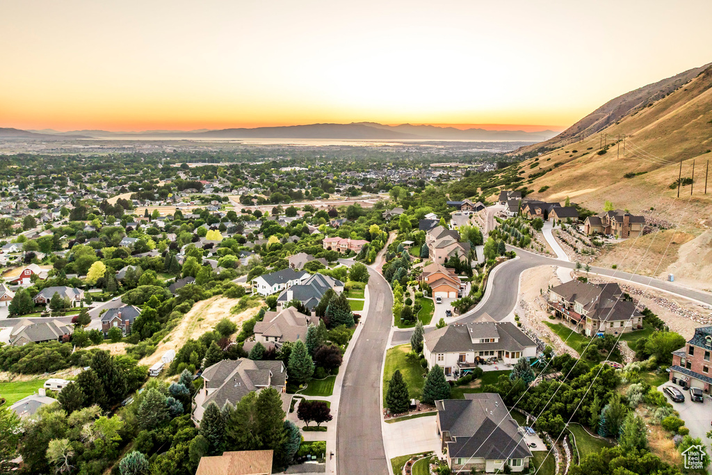 Aerial view of residential area with a mountain backdrop
