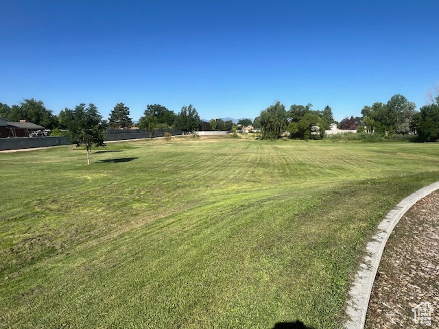Surrounding community featuring a lawn