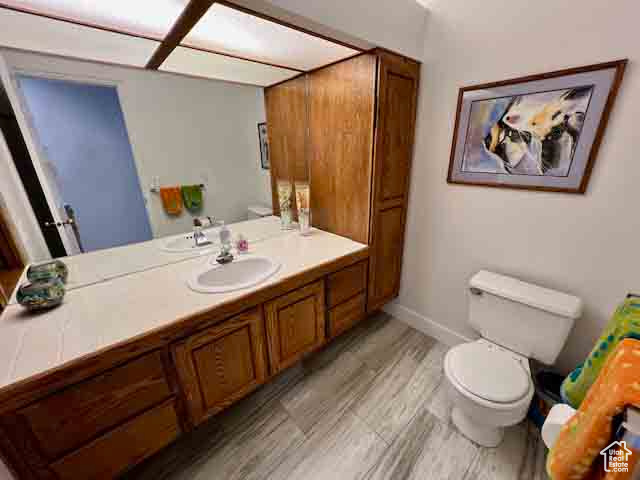 Bathroom featuring toilet and vanity