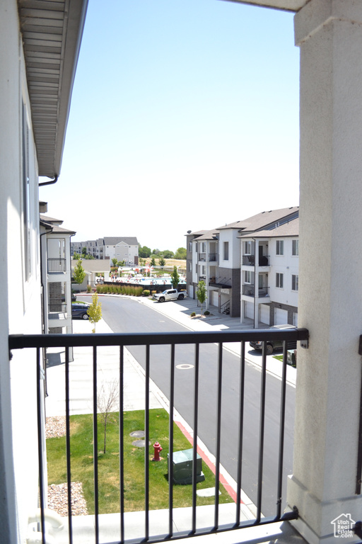 Balcony featuring a residential view