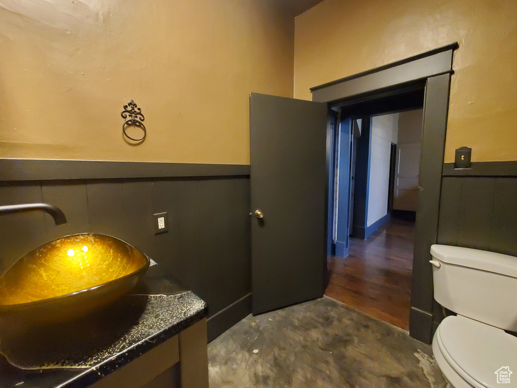 Bathroom featuring vanity and wainscoting