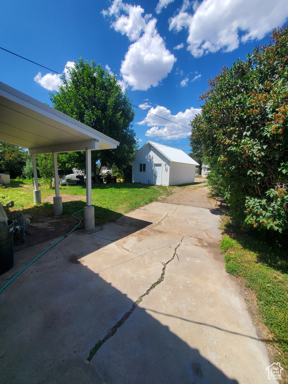 View of patio / terrace featuring an outdoor structure