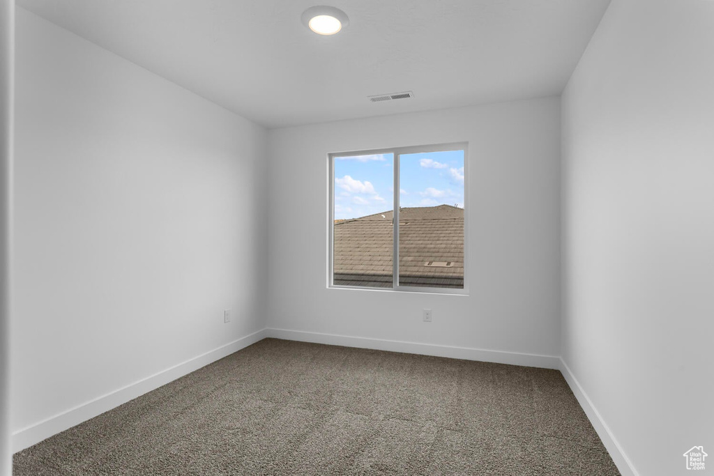 Unfurnished room featuring carpet floors