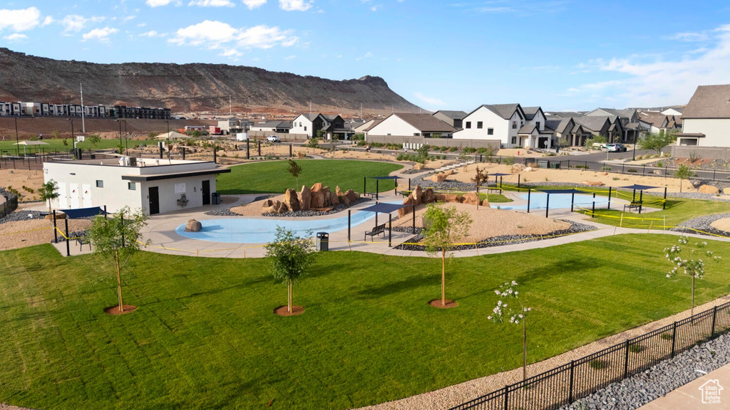 View of swimming pool featuring a mountain view and a residential view