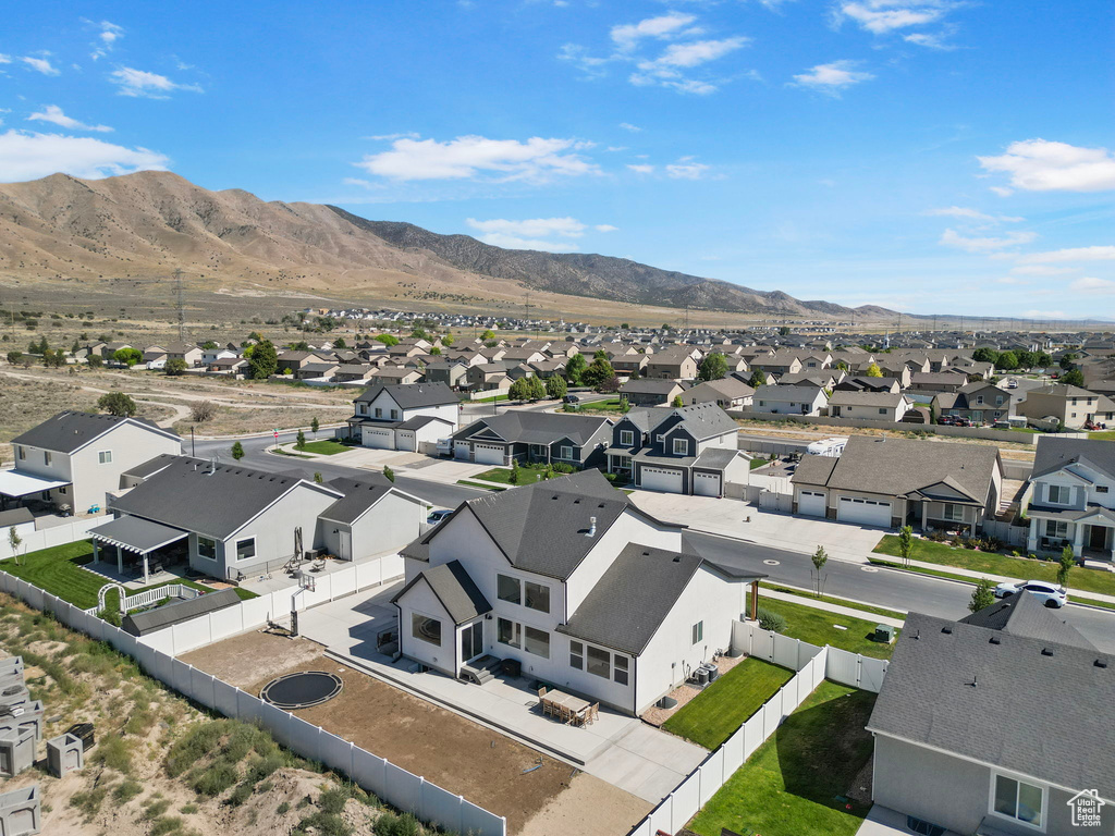 Aerial perspective of suburban area with mountains