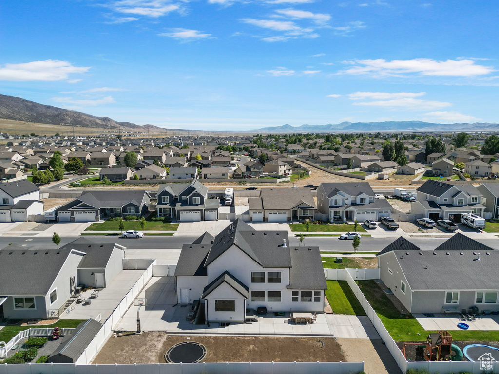 Aerial perspective of suburban area with mountains