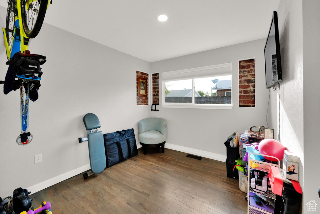 Game room featuring wood finished floors and recessed lighting