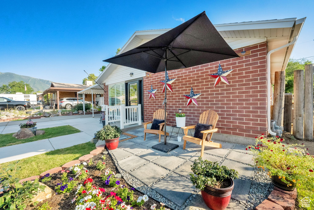 View of patio with a mountain view