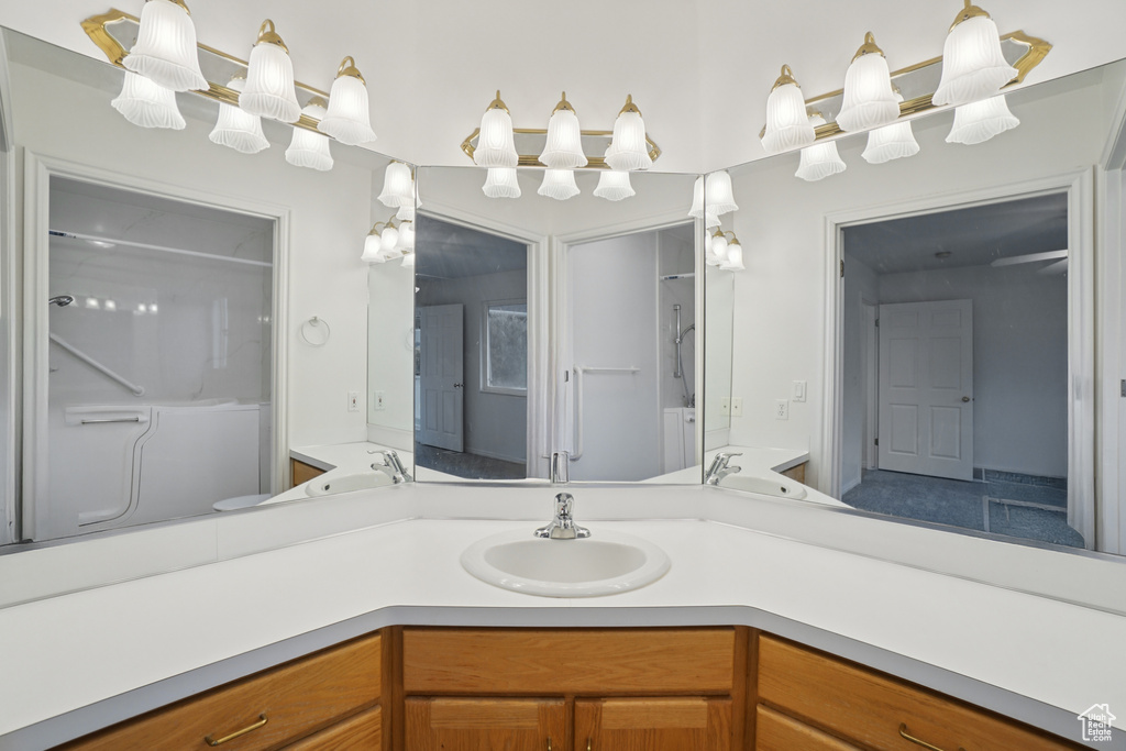 Bathroom with a shower and vanity