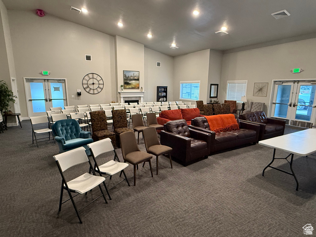 Lobby featuring high vaulted ceiling