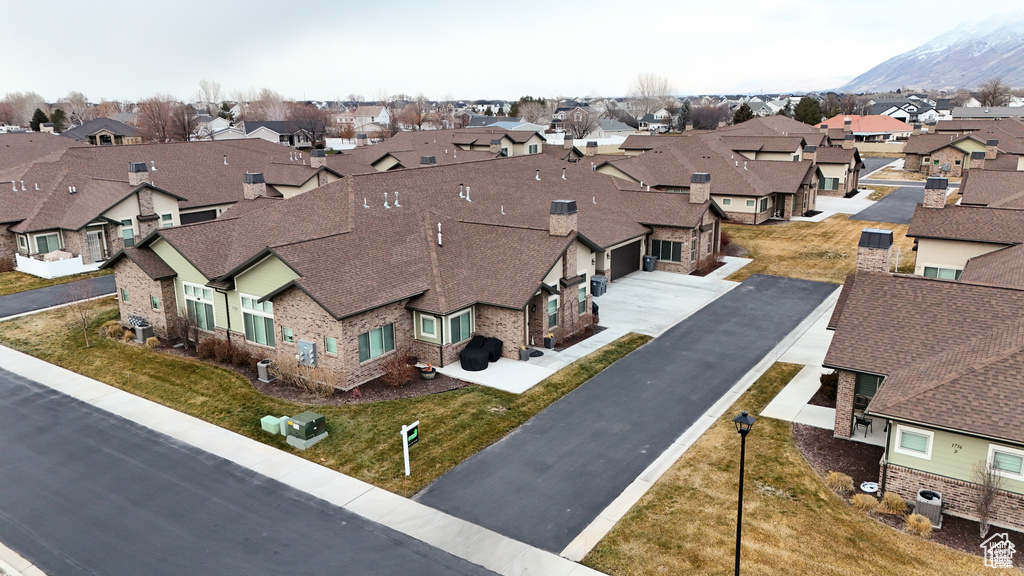 Aerial perspective of suburban area featuring mountains