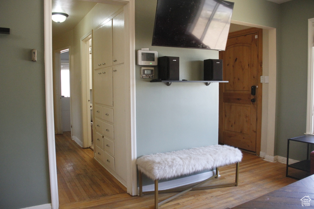 Hallway featuring light wood-type flooring